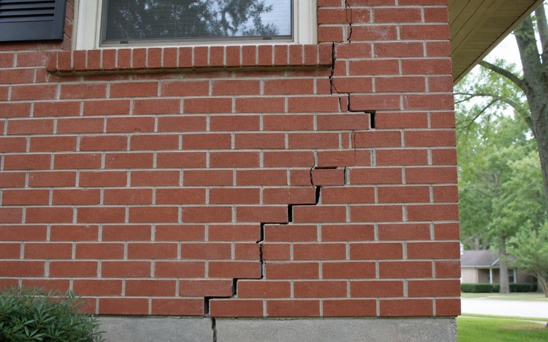 Stair-step cracks in a brick exterior wall